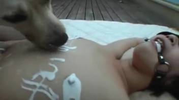 Japanese bombshell can't choose between two plump dog dicks