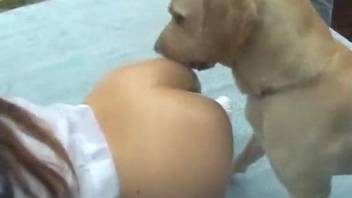 Horny redheaded chick wants to fuck her first dog