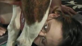 Nerdy teacher zoophile pleases her doggy in the filthy way