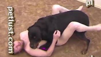Nude man bends ass to feel entire dog cock in his butt hole