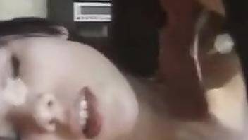Amateur cam babe filmed with a big dog cock in her mouth