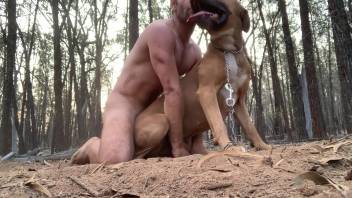 Buff guy pounding a super obedient beast