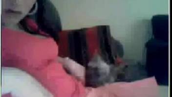 Webcam girl gets her pussy licked by trained dog
