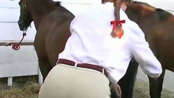 Professional jockey pleases her brown stallion