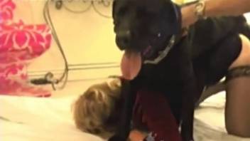 Blonde bombshell gets railed by a massively hung canine